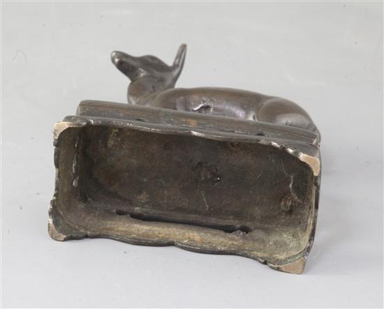 A Chinese bronze deer joss stick holder, 18th century, height 15cm